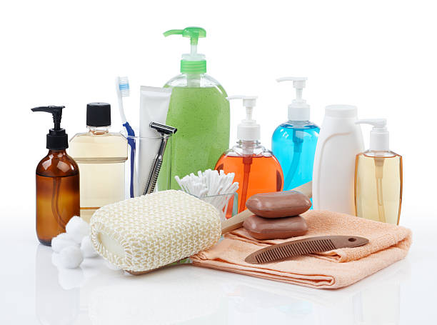 image depicts a variety of hygiene items such as sponges, soap, combs, toothbrushes, toothpaste, etc.